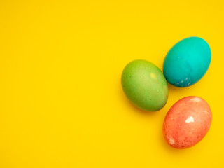 Colorful Easter Eggs On Yellow Background