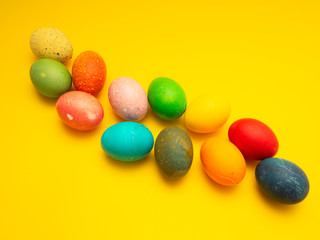Colorful Easter Eggs On Yellow Background