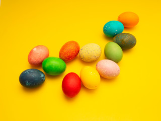 Colorful Easter Eggs On Yellow Background