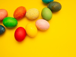 Colorful Easter Eggs On Yellow Background