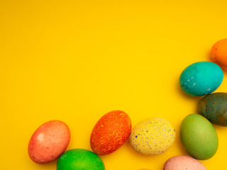 Colorful Easter Eggs On Yellow Background