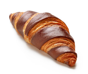 fresh baked croissant isolated on white background