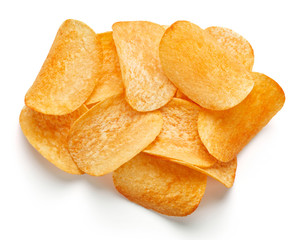 heap of fresh potato chips isolated on white background