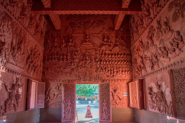 Red Temple - Wat Ratchathammaram interior with decorated walls