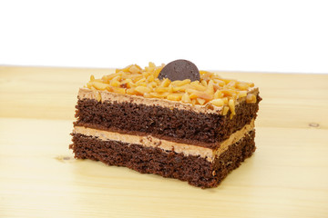 Cake on the wood background.