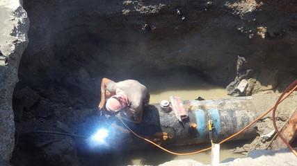 Workers are repairing water supply pipes in the city  – Image    