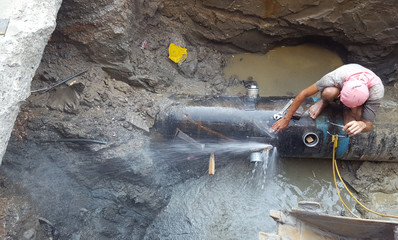Workers are repairing water supply pipes in the city  – Image    