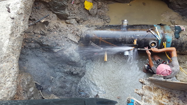 Workers are repairing water supply pipes in the city  – Image    