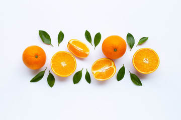 High vitamin C. Fresh orange citrus fruit with leaves isolated on white .