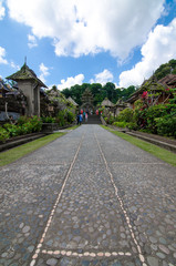 Fototapeta premium Penglipuran Village with blue skies above, Kubu, Bangli, Bali, Indonesia
