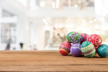 Colorful Easter egg side border against a rustic wood