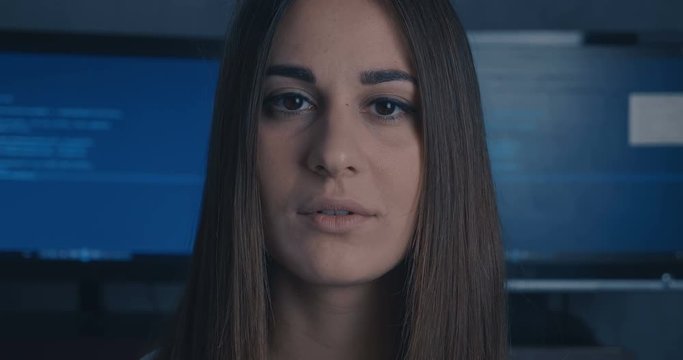 Close up face of Young Woman at binary code background