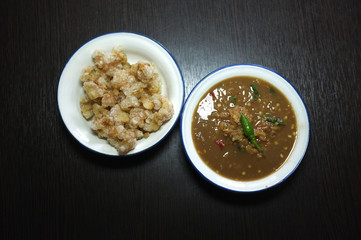 Shrimp Paste Chilli Sauce or Nam Prik Ka Pi with Pork scratching - obrazy, fototapety, plakaty