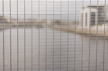 Bars fence with a blurry background 