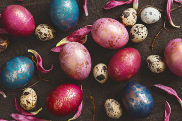 Pattern of painted colorful Easter eggs with golden spots