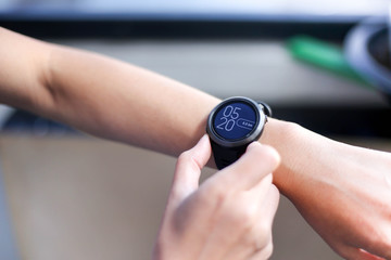 Use of fitness smart watch to monitor her performance.