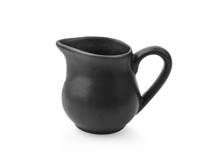 black small ceramic pitcher on white background.