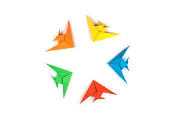 Paper origami fishes isolated on white background.