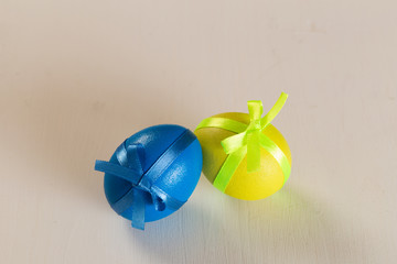 easter eggs on white wooden desk
