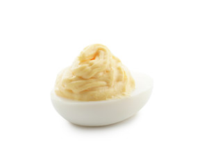 Tasty deviled egg on white background