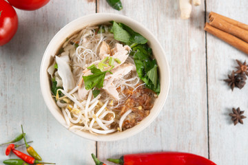 Rice noodles soup and chicken