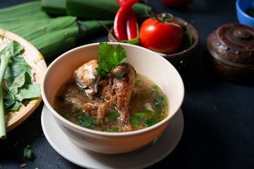 Chicken soup in bowl.