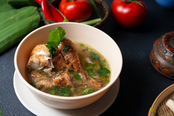 Chicken soup in bowl.
