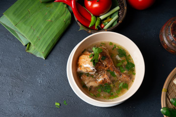 Chicken soup in bowl.