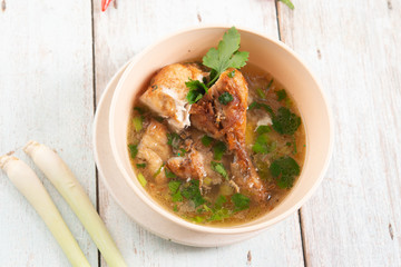 Chicken soup in bowl.