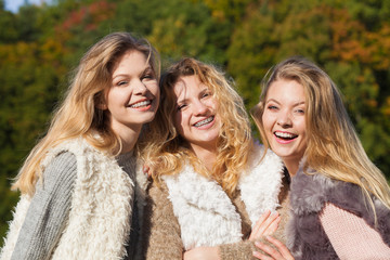 Obraz premium Three fashionable models outdoor