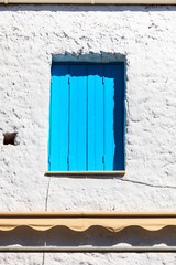 Greek blue window shutters