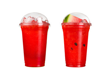 Delicious fruit smoothies in plastic cups, on a white background. Two cocktails with watermelon and berry flavors.
