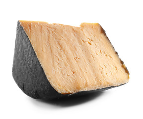 Piece of tasty cheese on white background