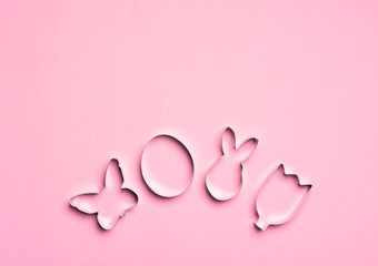 Easter Concept, Cookie Cutters on Pink Background