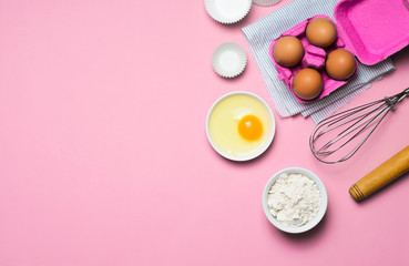 Baking Concept, Eggs, Flour, Whisk, Rolling Pin on Bright Background
