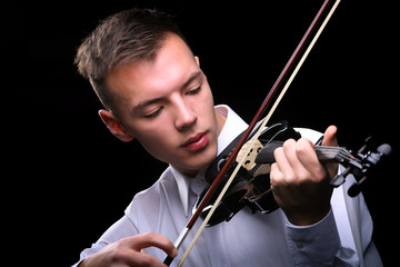 Young men playing the violin