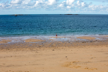 Beautiful sandy beach on the Emerald coast between Saint Malo and Cancale. Brittany, France