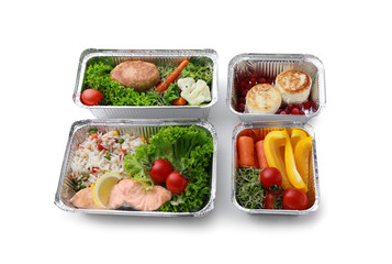 Containers with delicious food for delivery on white background