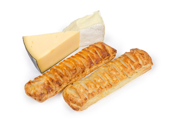 Cheese-stuffed bread sticks and pieces of different cheese