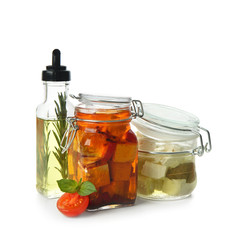 Composition with tasty feta cheese and olive oil on white background