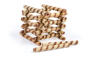 Striped wafer tubes with chocolate cream stacked in tower