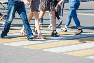 Fototapeta na wymiar pedestrians at a pedestrian crossing