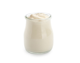 Jar of tasty yogurt on white background