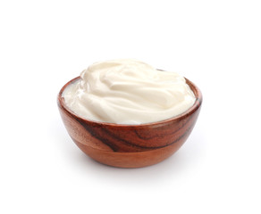 Bowl of tasty yogurt on white background
