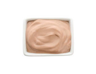 Bowl of tasty yogurt on white background