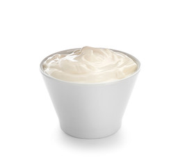 Bowl of tasty yogurt on white background