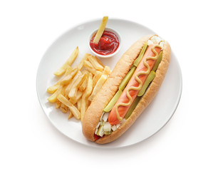 Plate with tasty hot dog and french fries on white background