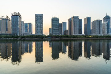 urban skyline and modern buildings at dusk, cityscape of China.