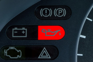 Screen symbols battery and Oil lamp warning light in-car dashboard