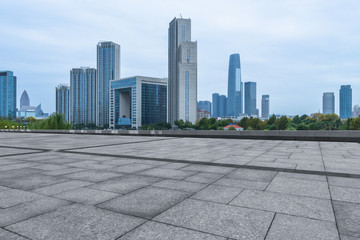 cityscape and skyline of Tianjin in blue sky from empty floor